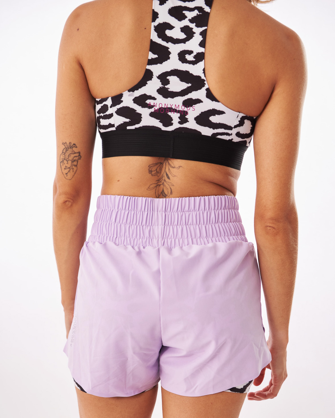 PANTALONETA RUNNING ANONYMUS PERFORMANCE LILA DAMA