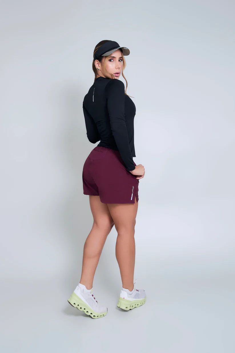 PANTALONETA MOTION IDROTT MERLOT DAMA