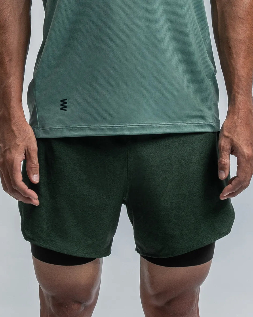 PANTALONETA RUNNING SUAREZ HYBRID DARK GREEN HOMBRE