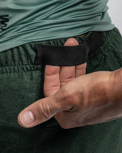 PANTALONETA RUNNING SUAREZ HYBRID DARK GREEN HOMBRE